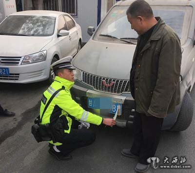 故意遮擋號牌  交警罰你沒商量